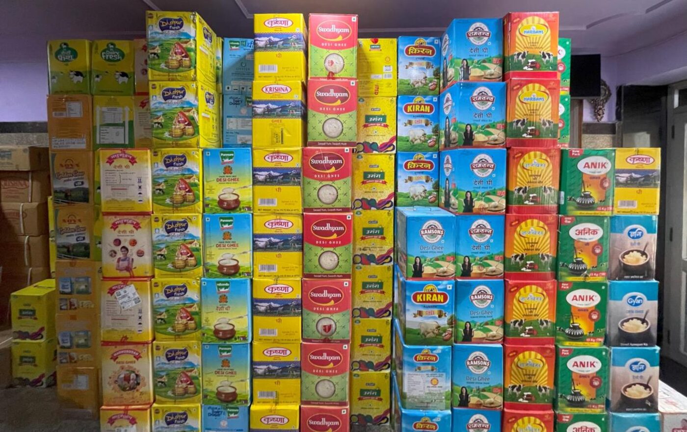 Inside an SDPS godown — stacked cartons of ghee from the 30+ brands we distribute across North India